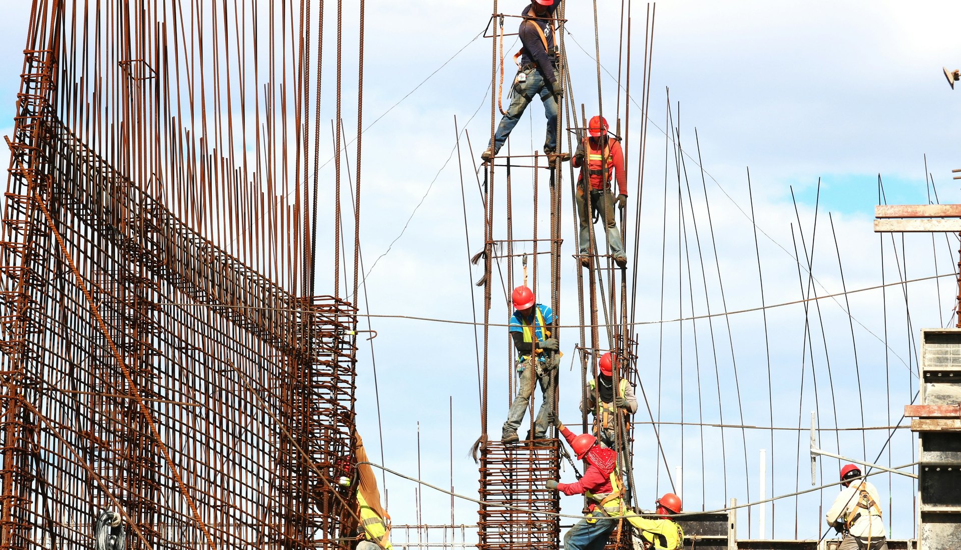 Construction team assembling reinforced infrastructure